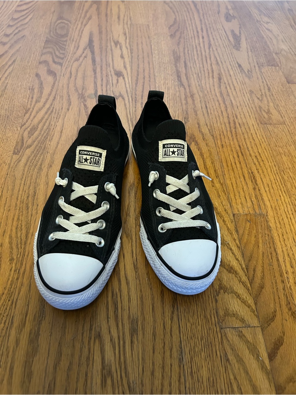 Women’s Converse Black and White Slip-On Canvas Sneakers